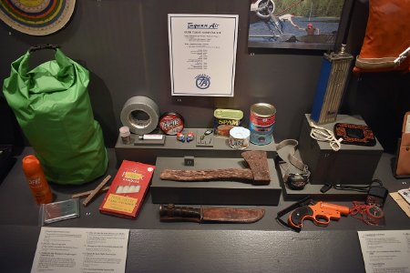 Survival kit display in Into the Wind exhibit