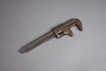 Adjustable open-ended wrench