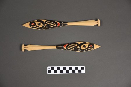 Model Tlingit canoe paddles with CM ruler