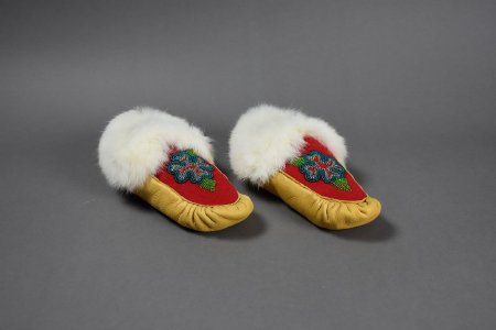 Beaded moccasins with blue flower design