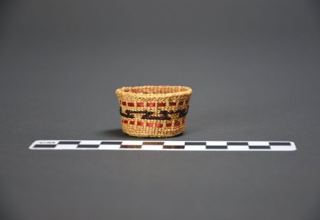 Haida spruce root basket with CM ruler