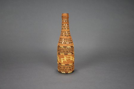 Basketry covered bottle