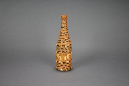 Basketry covered bottle