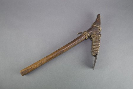 Adze with iron blade and wood handle