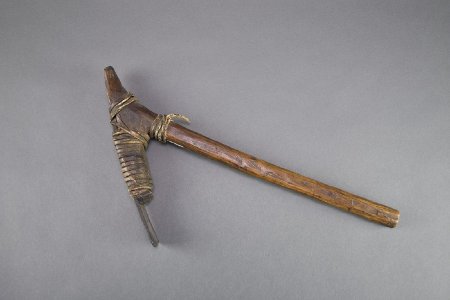 Adze with iron blade and wood handle