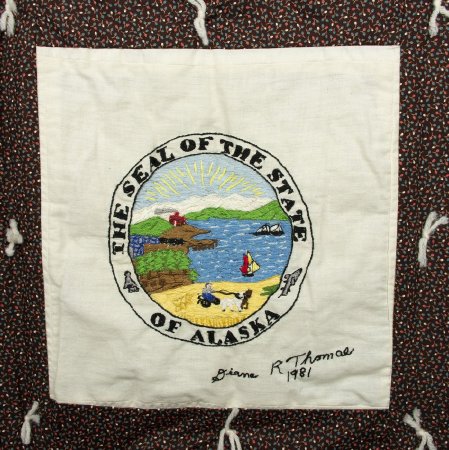 Alaska state seal block