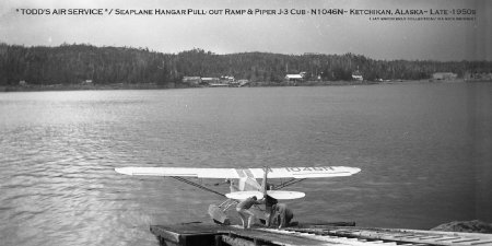 Piper J-3 N1046N on Pull Out Ramp, Ketchikan, AK, circa late 1950s