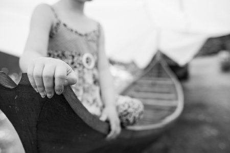 Stormy's Granddaughter Thavara Willis Sits in Canoe