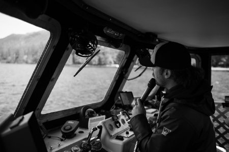 Captain Kyle Bailey Narrating a Tour to Guard Island
