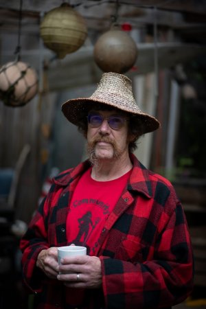 Haida Carver Stormy Hamar in front of his Kasaan Home