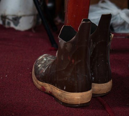 Cut Off Xtratuf Boots in the Cabin of <i>F/V Voyager</i>