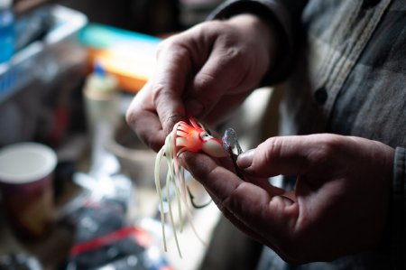 Robin Neilson Shows a Favored Hoochie on the <i>F/V Sultan</i>