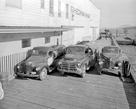 Ireland Transfer Company trucks on Heckman Wharf, 1953
